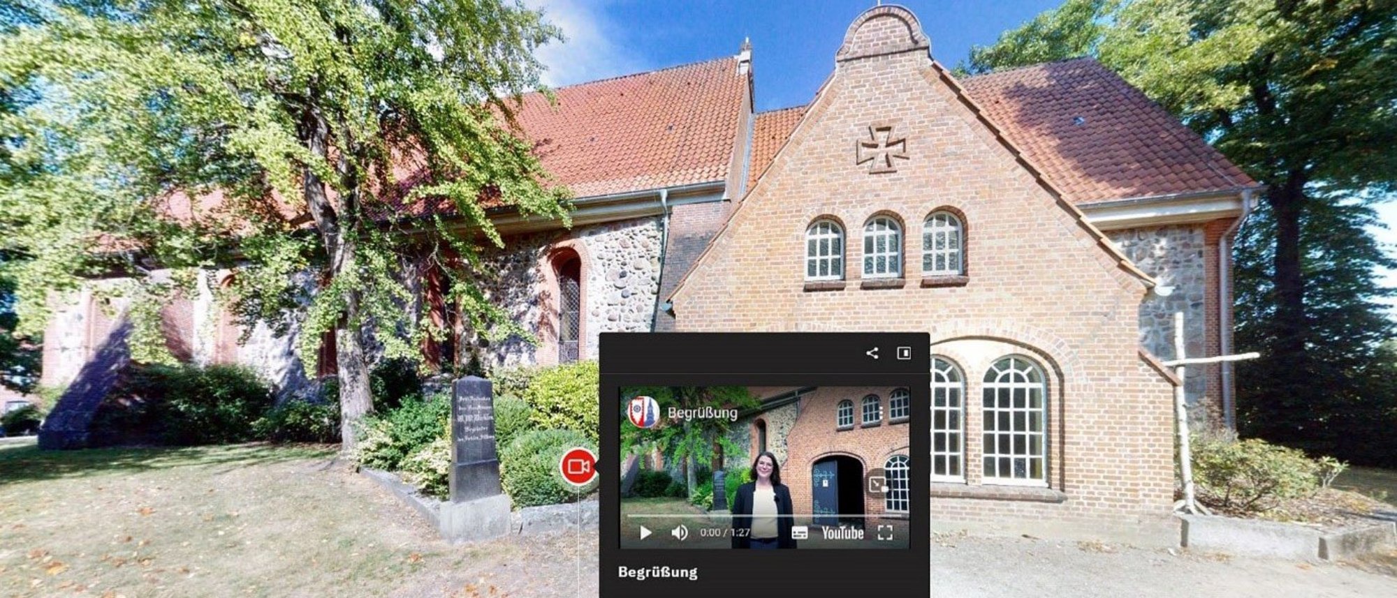 Die Kirche in Schenefeld mit einem digitalen Abbild im Vordergrund
